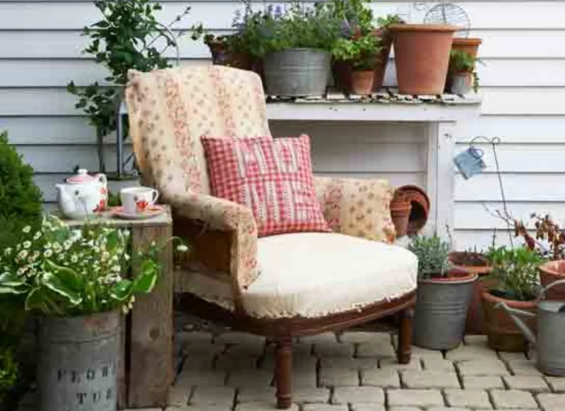A cozy armchair in a vintage garden